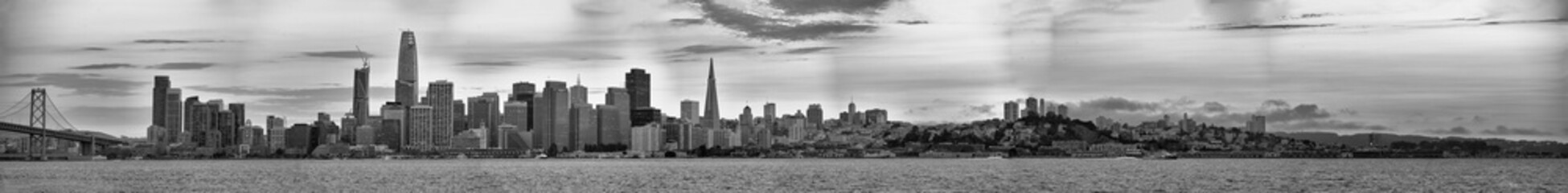 SAN FRANCISCO, CA - AUGUST 4, 2017: Panoramic sunset view of city skyline. The city attracts 20...