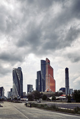 Moscow City skyscrapers in summer in cloudy weather perspective