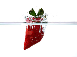 strawberry in water splash isolated on white background