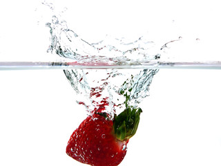 strawberry in water splash isolated on white background