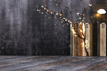 Wooden floor board or table on the background of the wall for chalk, a toy fence and a garland on the tree