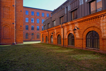 Fototapeta na wymiar Ancient textile factory - Loft Aparts - details of architecture of the city of Lodz, Poland