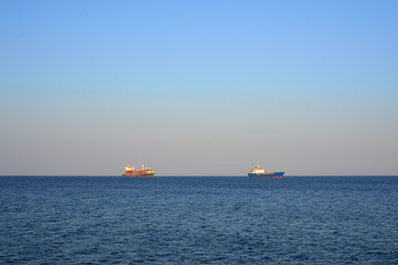 cargo ships on the horizon