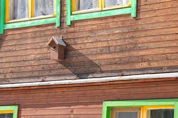 handmade nesting house on a facade