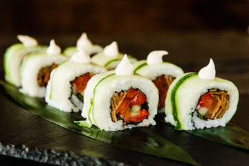 rolls with fresh fish, vegetables and cream cheese