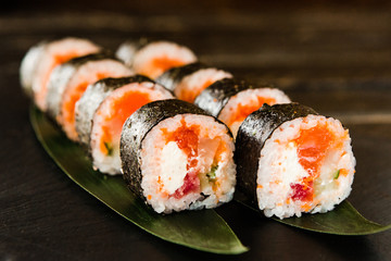 rolls with fresh fish, vegetables and cream cheese