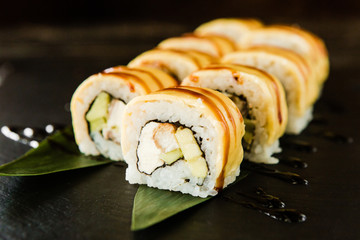 rolls with fresh fish, vegetables and cream cheese