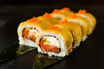 rolls with fresh fish, vegetables and cream cheese