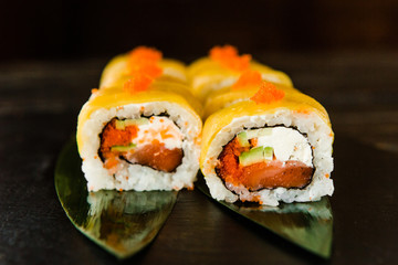 rolls with fresh fish, vegetables and cream cheese