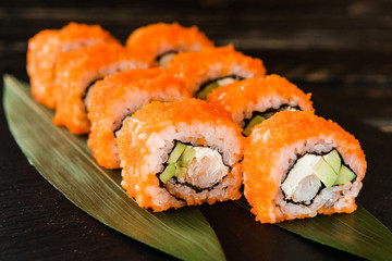 rolls with fresh fish, vegetables and cream cheese