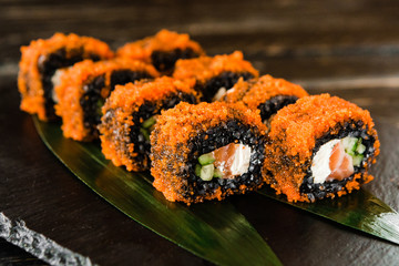 rolls with fresh fish, vegetables and cream cheese