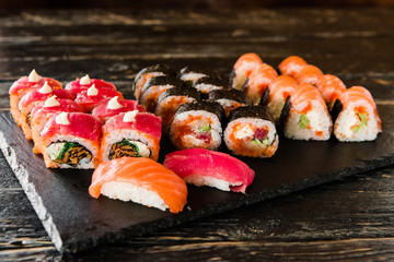 rolls with fresh fish, vegetables and cream cheese