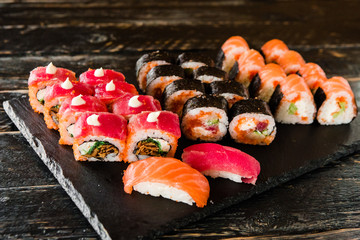 rolls with fresh fish, vegetables and cream cheese
