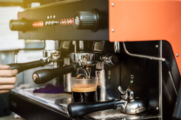 Coffee machine make hot coffee in cafe