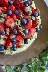  Top view from pistachio layer cake with berries