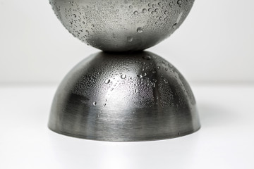 Stainless steel dishes for vegetables. White background