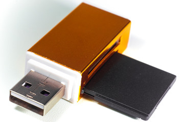 memory gold card reader on white background