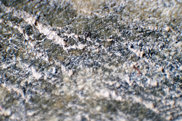 Iron ore.Metallic iron. Close up. Blurred boundaries. Minerals of the Earth. Extraction of natural iron ore. Benefits for the economy. Rocks and minerals.