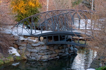 Bridge at sunset across the river