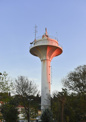 white radar tower. clear sky