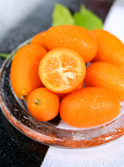 tangerines on wooden table