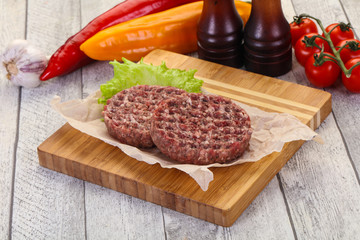 Raw burger cutlet