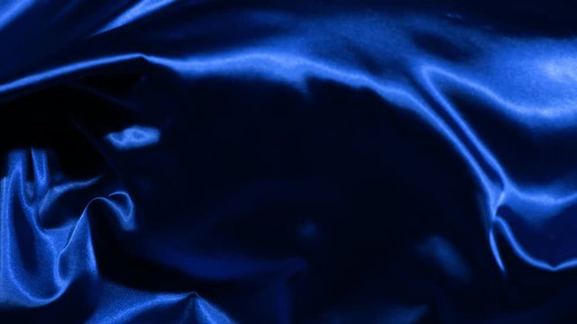 Super slow motion of waving blue velvet cloth in detail. Filmed on high speed cinema camera, 1000fps.