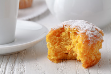 Homemade pumpkin muffins on the wooden table