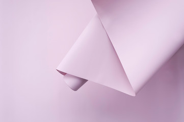 Pink roll paper. Abstract soft pastel colors backdrop with space for text. Trendy creative background.