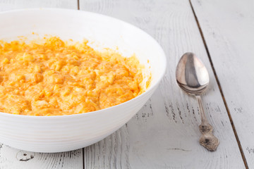 Fresh orange pumpkin, sliced and grated, prepare for cooking. Organic, seasonal, natural and healthy food concept