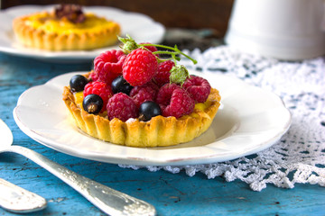  tartalets with lemon curd  nuts and berry