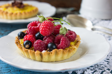  tartalets with lemon curd  nuts and berry