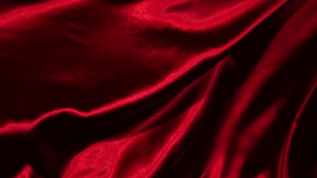 Super slow motion of waving red velvet cloth in detail. Filmed on high speed cinema camera, 1000fps.