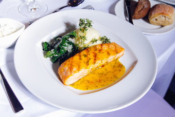 Grilled Salmon Steak with Spinach,Mash potato, souse