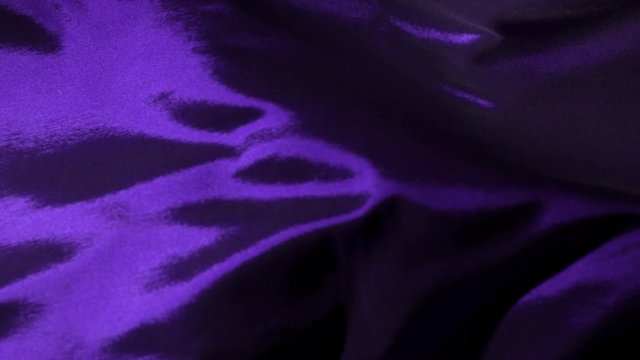 Super slow motion of waving purple velvet cloth in detail. Filmed on high speed cinema camera, 1000fps.
