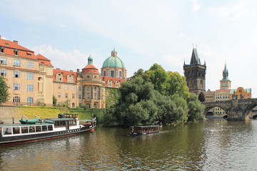 Fototapeta na wymiar View from the Vltava river on the monastery and Basilica of St. Francis of Assisi in Prague Czech Republic