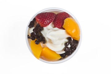 yogurt ice cream with fruits view from above isolated on white