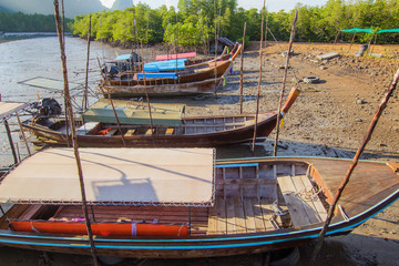 Fototapeta premium Thai Long tail boat Morning sky blue sky at Samed Nang Chee scenic spot Tropical area in Phang Nga Thailand