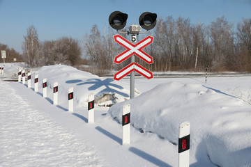 sign adjustable railway crossing equipped with a semaphore, signal columns.