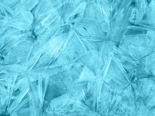 Ice crystal texture. Frozen water surface. Transparent ice crystals cracked background