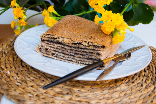 Pie with poppy. Traditional tajil katlama pie.
