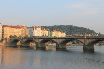 Obraz premium View of the embankment from the palatsky bridge in Prague 