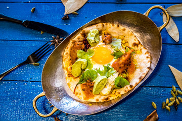 Indian style breakfast on colorful table