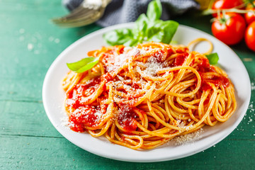 Tasty italian pizza with tomato sauce and parmesan