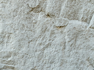 Mur en béton avec nombreuses traces
