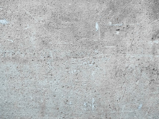 Mur en béton avec nombreuses traces