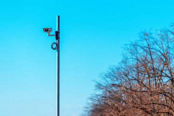 Traffic surveillance camera mounted on the post