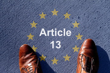 Controversial EU law: Article 13. EU flag and new copyright bill
