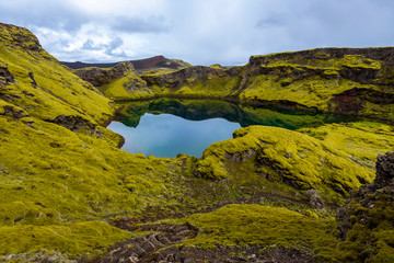 The crater Tjarnargigur filled with water is one of most impressive craters of Lakagigar volcanic fissure area in Southern highlands of Iceland.
