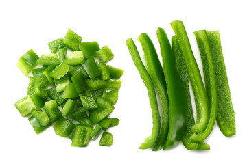 cut slices of green sweet bell pepper isolated on white background top view